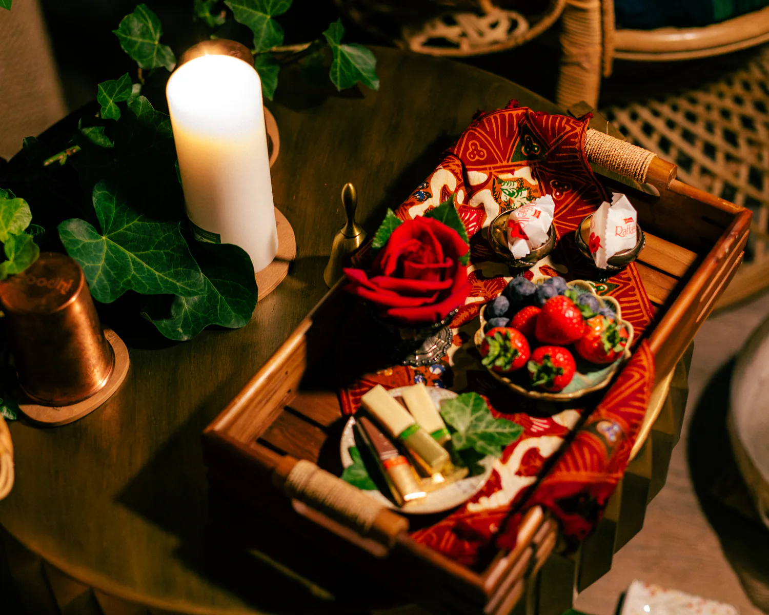 Welcome tray with flowers and refreshments in a warm spa interior