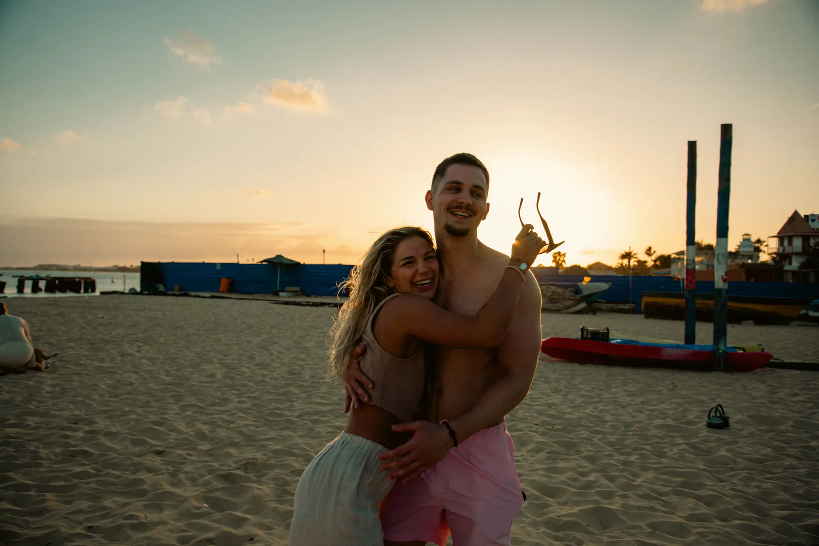 Darius and Valentina together in warm sunset light
