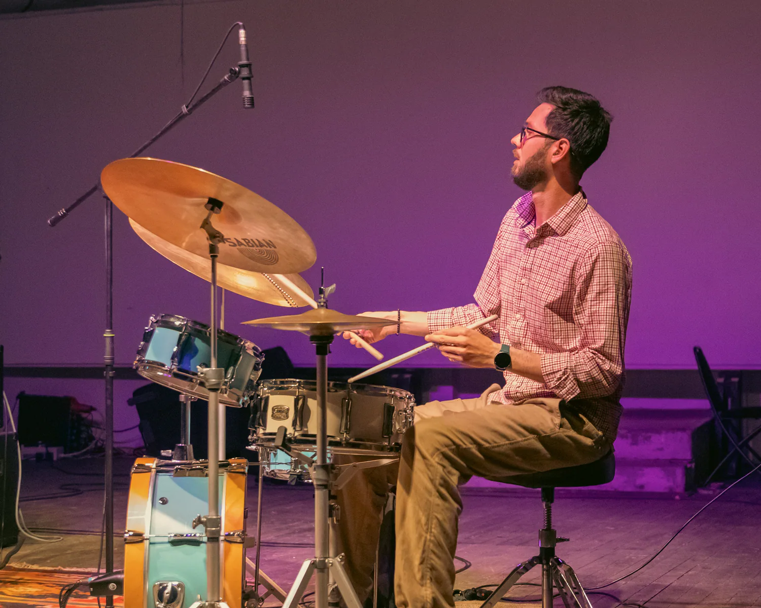 Drummer performing on stage