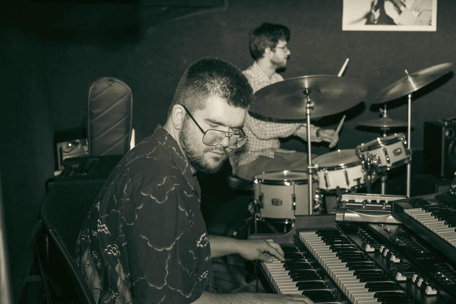 Close view of a musician playing a keyboard