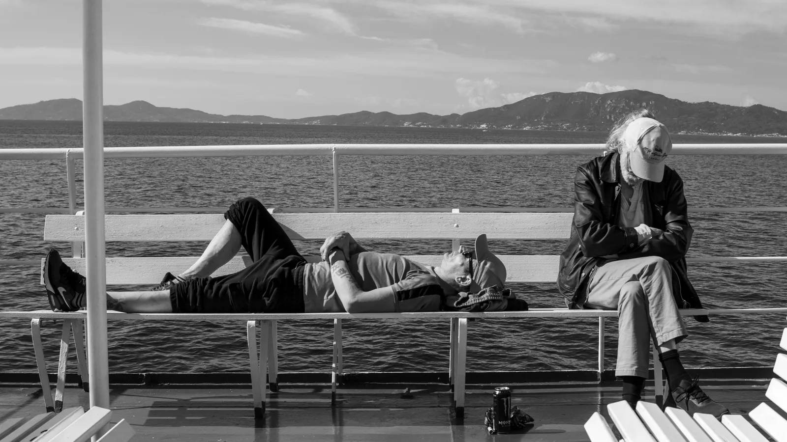 Travellers seated together on a ferry
