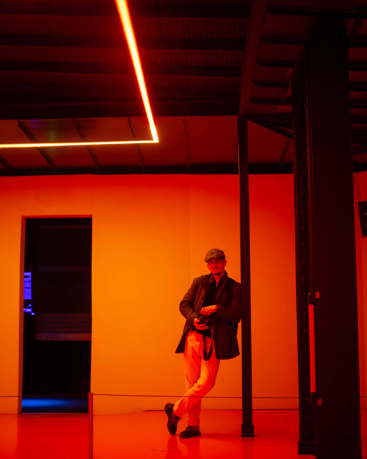 Portrait of a person illuminated by red light