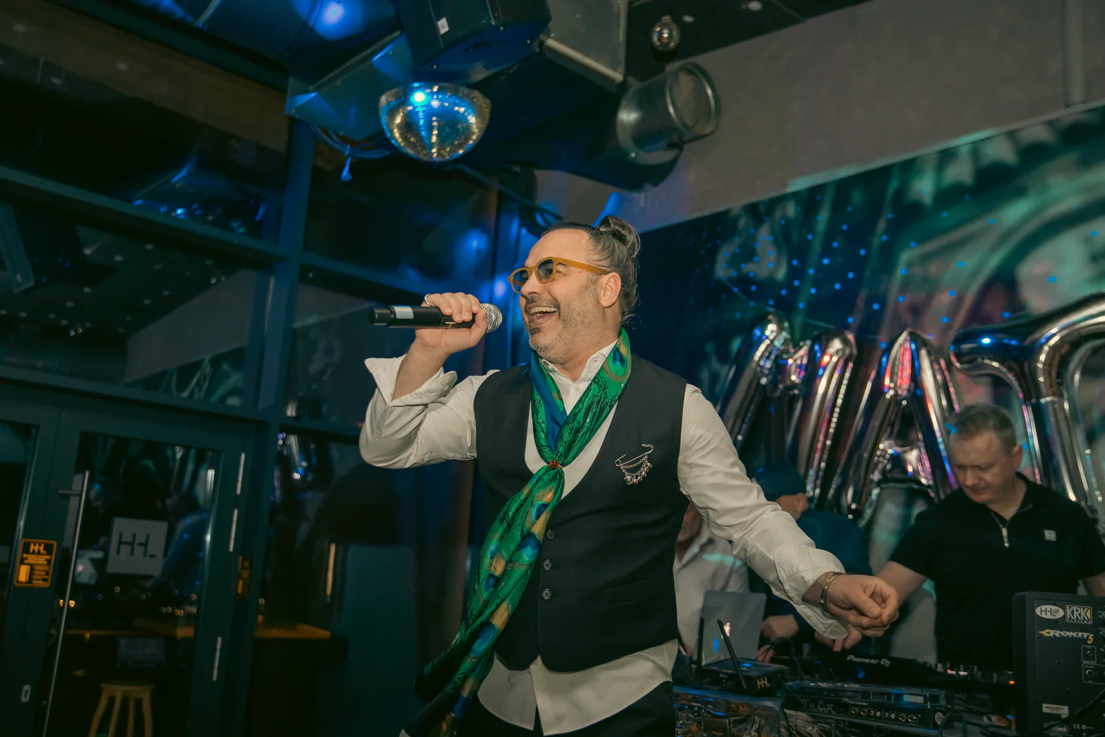 Vocalist singing during an indoor event