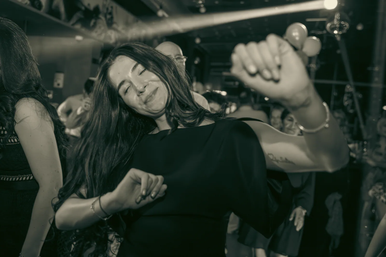 Guest dancing during an indoor celebration