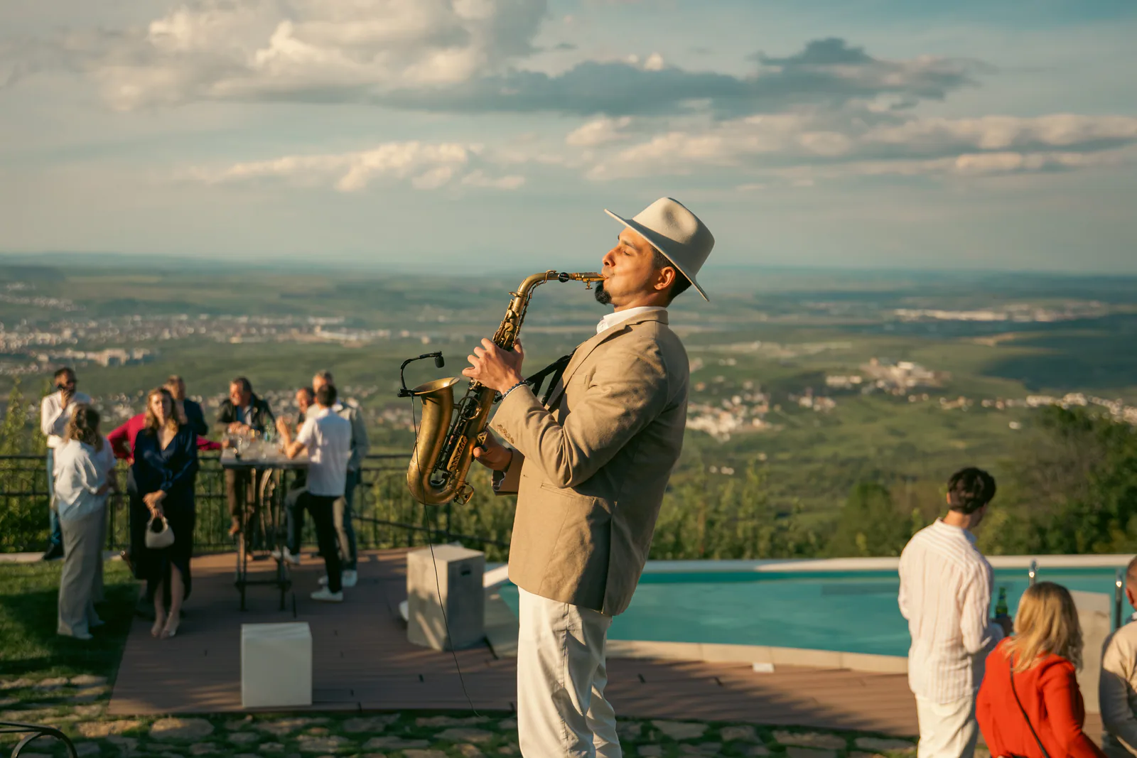 Saxophone player performing outdoors